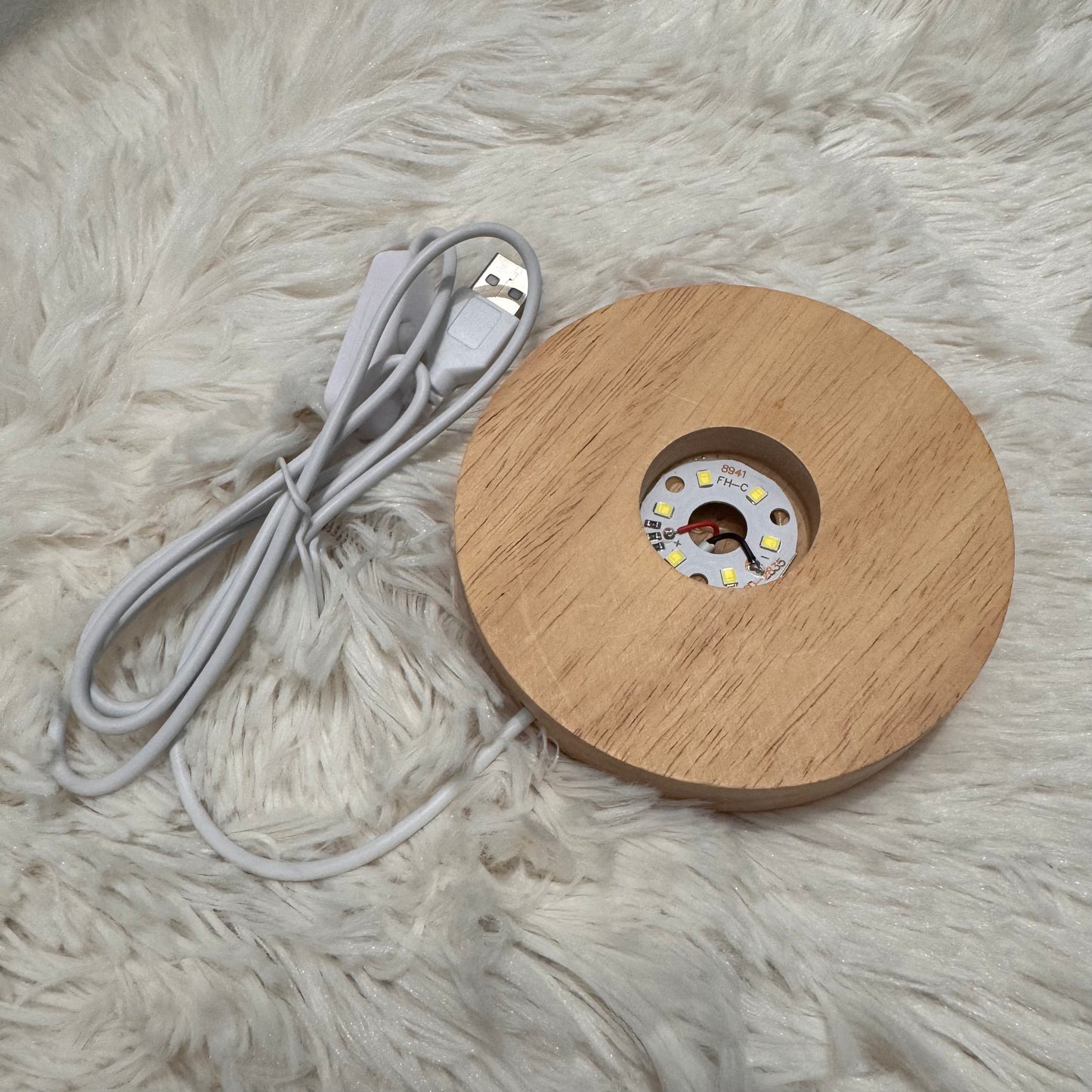 Base luminosa in legno